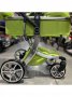 Коляска трансформер Luxmom 608 2 в 1 светло-зеленый экокожа
